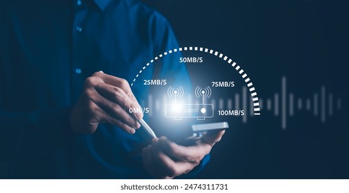 Fast internet connection with Metaverse technology concept, Hand holding smartphone and Virtual screen of Internet speed measurement,Internet and technology concept, 5G Hi speed internet concept - Powered by Shutterstock