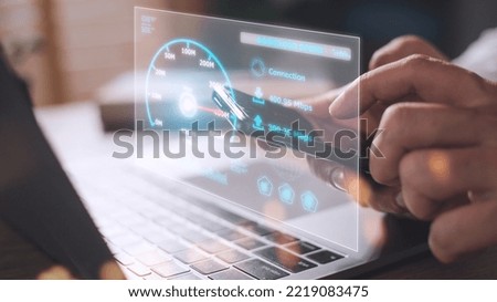 Fast internet connection with Metaverse technology concept, Hand holding smartphone and Virtual screen of Internet speed measurement, Internet and technology concept, 5G Hi speed internet concept