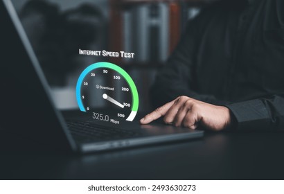 Fast internet network connection speed test. Man using a laptop computer to check bandwidth of wireless networking or 5G cellular Mbps or Gbps speed quality. Wi-Fi 7 download or upload transfer rate. - Powered by Shutterstock