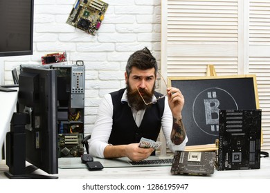 Fast mining server. Virtual or digital currency. Bitcoin miner man in server room. Bearded businessman with computer circuits and dollars. Bearded man bitcoiner. Crypto currency mining hardware.