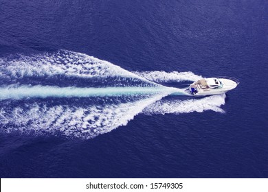 fast motor boat with splash and wake