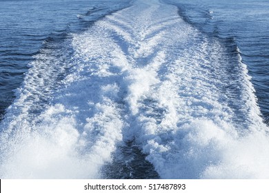 Fast Motor Boat Wake Over Blue Sea Water