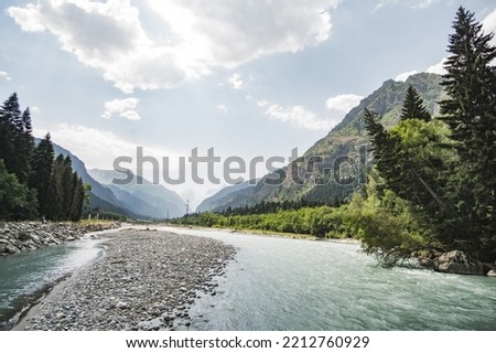 Similar – Image, Stock Photo River flows through rocks (Wadi in Oman)