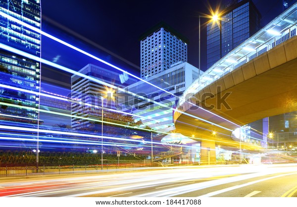 Fast moving car light in\
Hong Kong