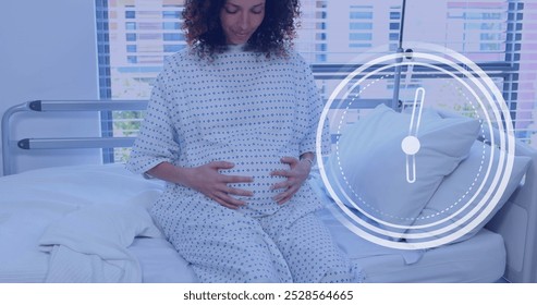 Fast moving clock over happy pregnant biracial woman rubbing belly in hospital room. Pregnancy, healthcare, expectancy, time, development, motherhood and medical services digitally generated image. - Powered by Shutterstock