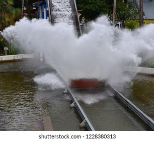 A Fast Moving Water Coaster In A Waterpark Makes A Splash