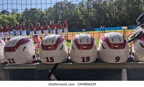 Fast Pitch Softball Helmets With The Girls On The Field.