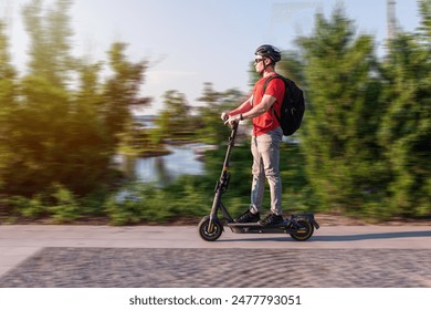 Fast ride on an electric scooter, photo with blur in motion.