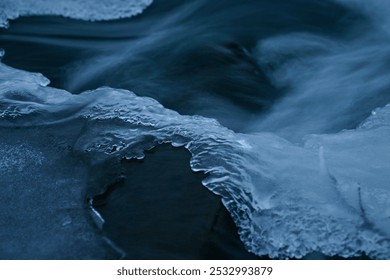 Fast river flow close-up. Rapids and glare, ice floes. Peace, tranquility, eternity, balance. Art photography, beautiful background, design