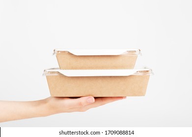 Fast Shipping. Female Hand Holding Cardboard Box. Food Delivery Service. Mockup Style And Copy Space. Package And Conveyance Concept. Isolated On White