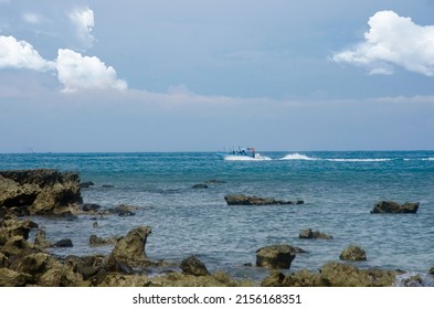 Fast Speed Boat In The Sea With Blue Sky Background