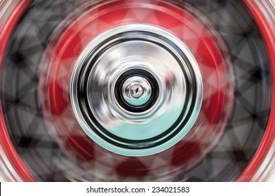 Fast Spinning Wheel Of A Car. Motion Blur And Fast Speed.