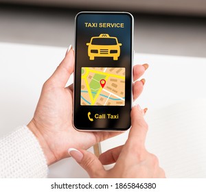 Fast Transportation Concept. Overhead closeup view of female hand holding smart phone with taxi app interface, ordering cab, using mobile service, making call, choosing destination