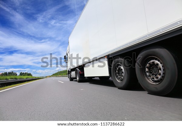 A fast truck running on\
the highway