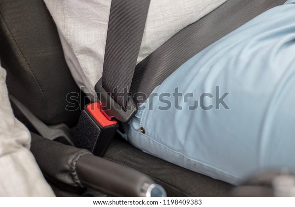 Fasten the car seat belt. Safety belt safety\
first while driving