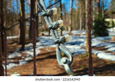 Fastening elements of the cable made of galvanized steel, couches, clamps.Fastening system for the rope park.