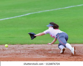 Fastpitch Softball Player Making A Great Catch