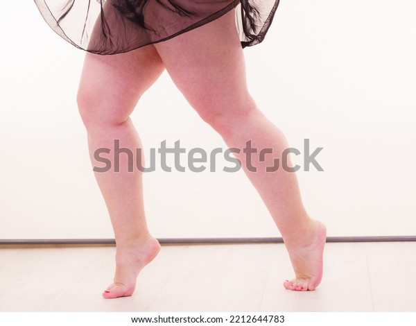 Fat adult woman short stature, plus size female,
legs only. Big body.