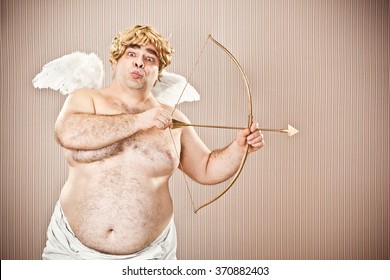 Fat Blonde Cupid With Bow And Arrow Aim For Love For Valentine Day