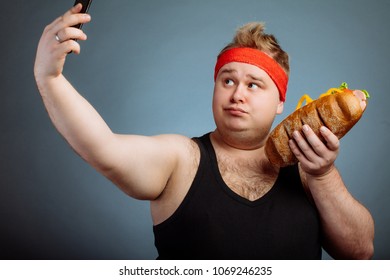 Fat Funny Man With Sandwich In Hand Makes Selfie