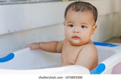 Fat Kid Is Bathing Happily With His Mother