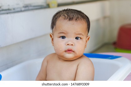 Fat Kid Is Bathing Happily With His Mother