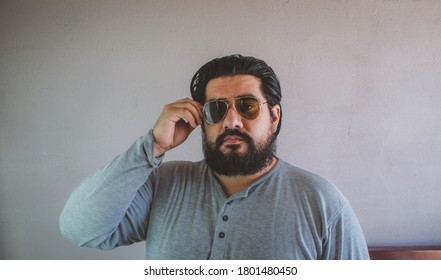 Fat Latin Man With Beard Wearing Aviator Glasses