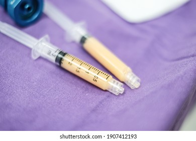 Fat From Liposuction In Syringes For Fat Transfer. Selective Focus