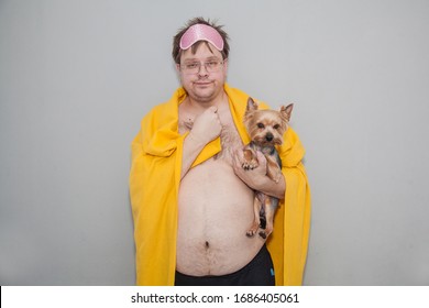 A Fat Man With A Beer Belly Woke Up In The Morning With His Dog.