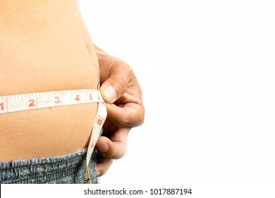 Fat man belly with measuring tape. Lose weight concept,copy space.