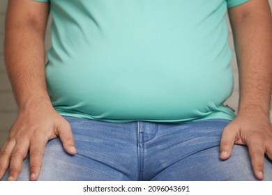 558 Fat man sitting on chair Stock Photos, Images & Photography ...