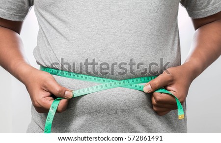 fat man check out his body fat with measuring tape for white or obesity background