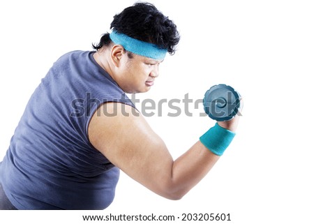 Fat man exercising with a dumbbell. isolated on white background