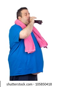 Fat Man In The Gym Drinking Cola Isolated On A White Background