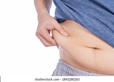 Fat Man Holding Excessive Fat Belly, Overweight Fatty Belly Isolated White Background. Diet Lifestyle, Weight Loss, Stomach Muscle, Healthy Concept.