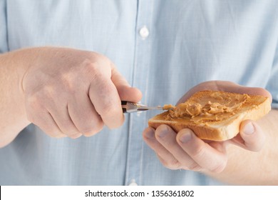 Fat Man Holding A Peanut Butter Toast