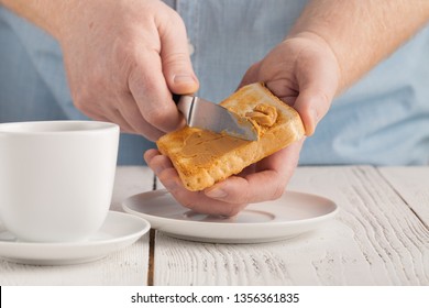 Fat Man Holding A Peanut Butter Toast