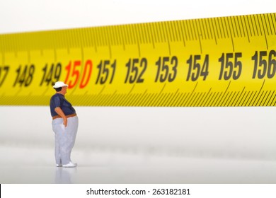 Fat Man And Measurer - Obesity Concept