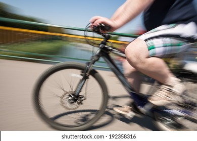 fat person riding a bike