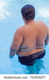 Fat Man Swimming In The Pool