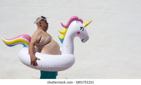  Fat Man With Unicorn Float