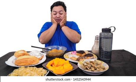 Fat Or Overweight Asian Man Surprise And Happy With A Lot Of Unhealthy Food On The Table Isolated In White, Fat Man Diet Concept