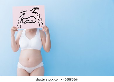 Fat Overweight Woman Take Crying Billboard And Body With Blue Background, Asian