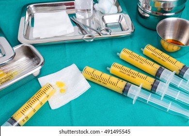 Fat Syringes On The Green Surgical Drapes For Fat Grafting Or Fat Transfer Procedure