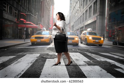 Fat Woman Crossing A City Street