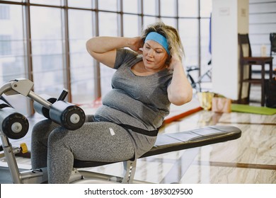 Fat Woman Dieting, Fitness. Portrait Of Obese Woman Working Out In Gym.