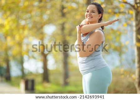 Fat woman doing sports. High quality photo