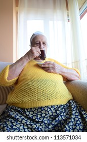 Fat Woman Drinking Coffee/tea