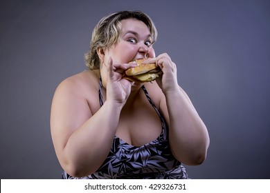 fat woman eating fast food