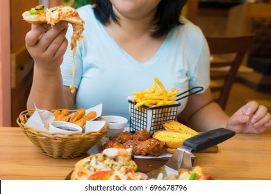 Fat Woman Enjoy Eating Pizza And Fast Food,unhealthy Lifestyles,overweight Female Have Big Meal